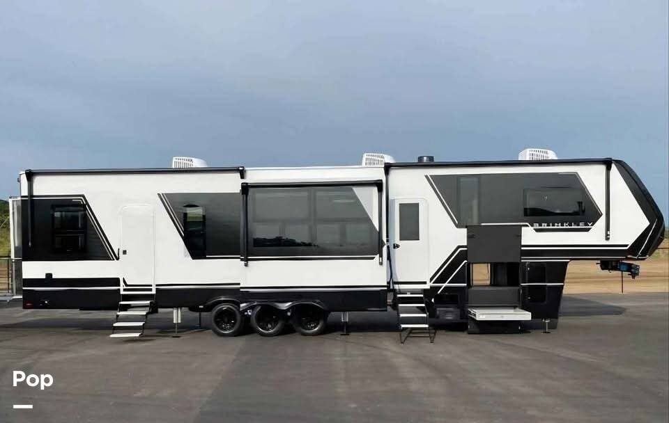 2025 Miscellaneous Brinkley G 3950 - Used Toy Hauler For Sale by Pop RVs in Rockport, Texas features Air Conditioning, Slideout, Leveling Jacks, Awning, Generator
