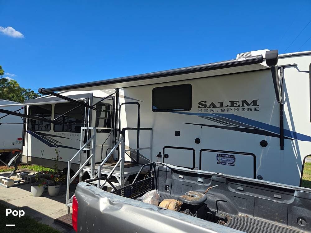 2022 Forest River Salem Hemisphere 34RL - Used Fifth Wheel For Sale by Pop RVs in Saint Petersburg, Florida features Slideout, Air Conditioning, Awning