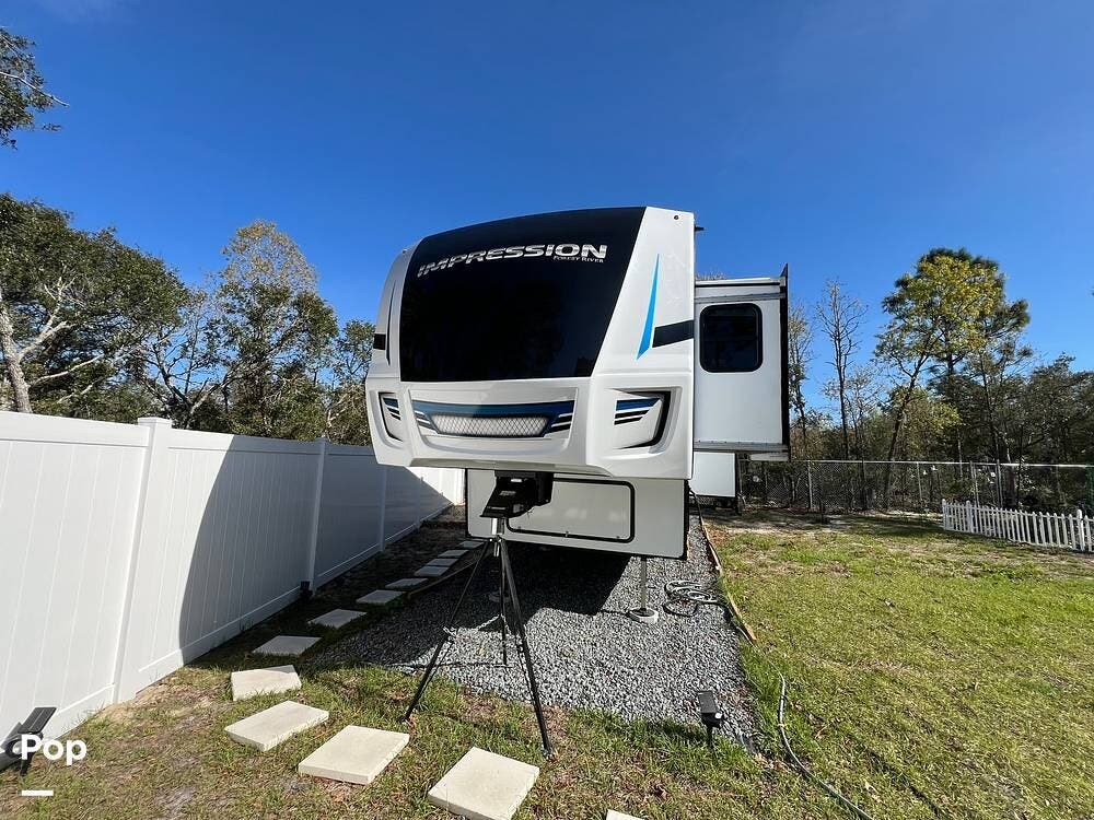 2024 Forest River Impression 318RLVIEW - Used Fifth Wheel For Sale by Pop RVs in Ocala, Florida features Awning, Air Conditioning, Leveling Jacks, Slideout