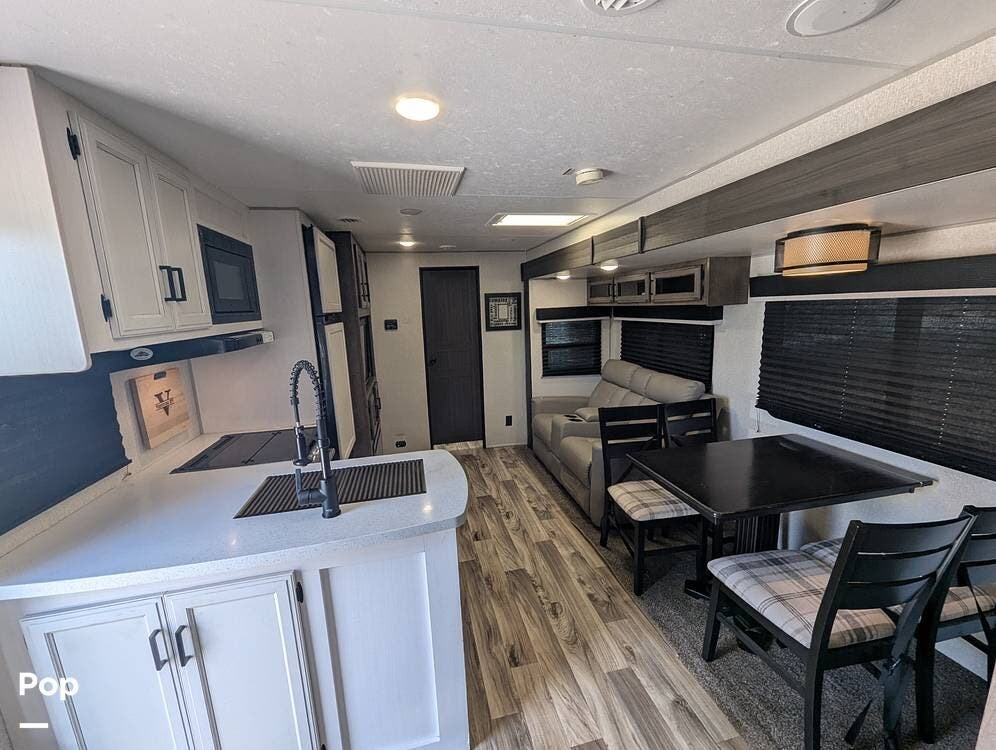 2022 Venture RV SportTrek Touring 302VRB - Used Travel Trailer For Sale by Pop RVs in Punta Gorda, Florida features Slideout, Air Conditioning, Awning