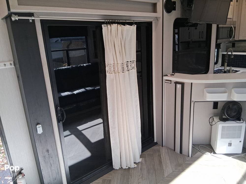 2022 Heartland Cyclone 4270 - Used Toy Hauler For Sale by Pop RVs in Essexville, Michigan features Slideout, Leveling Jacks, Awning, Air Conditioning, Generator