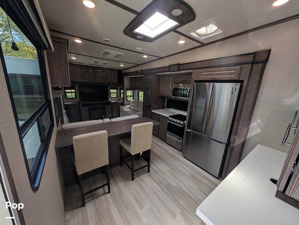 2022 Grand Design Solitude S-Class 3330RE - Used Fifth Wheel For Sale by Pop RVs in Mount Juliet, Tennessee features Slideout