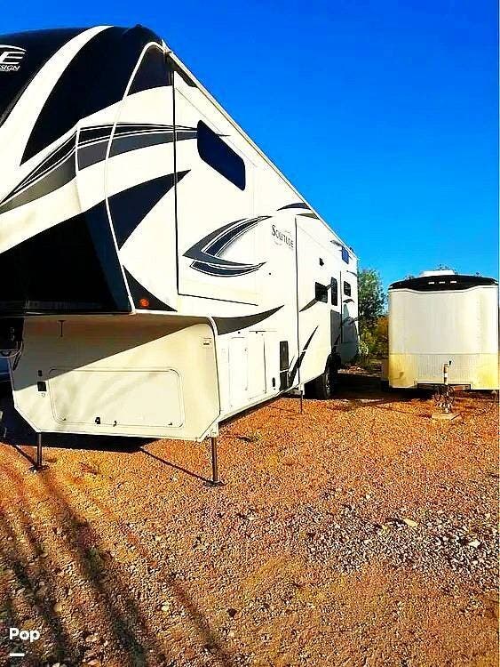 2023 Grand Design Solitude 391DL - Used Fifth Wheel For Sale by Pop RVs in Corydon, Indiana features Leveling Jacks, Air Conditioning, Awning, Slideout