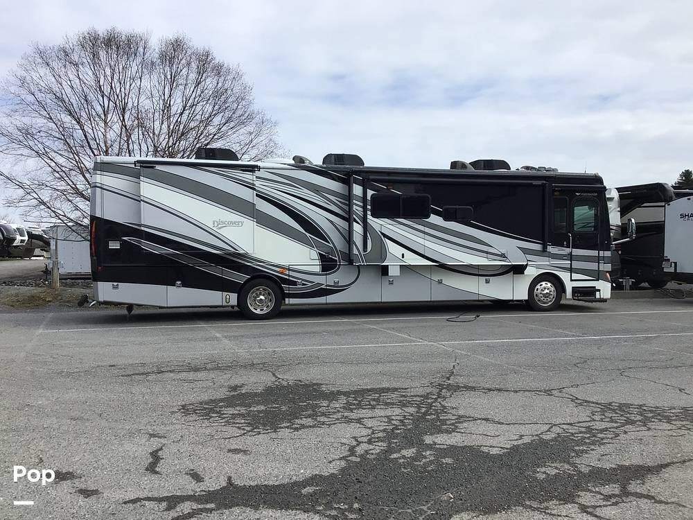 2012 Fleetwood Discovery 40X - Used Diesel Pusher For Sale by Pop RVs in Thurmont, Maryland features Generator, Slideout, Air Conditioning, Leveling Jacks, Awning