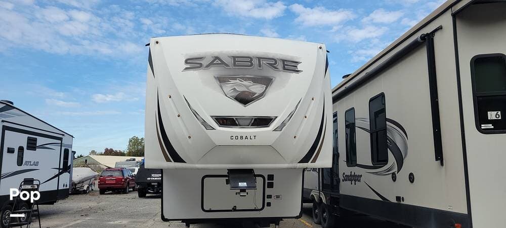 2021 Forest River Sabre 37FBT - Used Fifth Wheel For Sale by Pop RVs in Knoxville, Tennessee features Slideout, Awning, Air Conditioning
