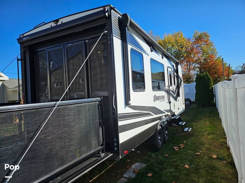 2023 Grand Design Momentum 23G - Used Toy Hauler For Sale by Pop RVs in Bristol, Connecticut features Air Conditioning, Slideout, Generator, Leveling Jacks, Awning
