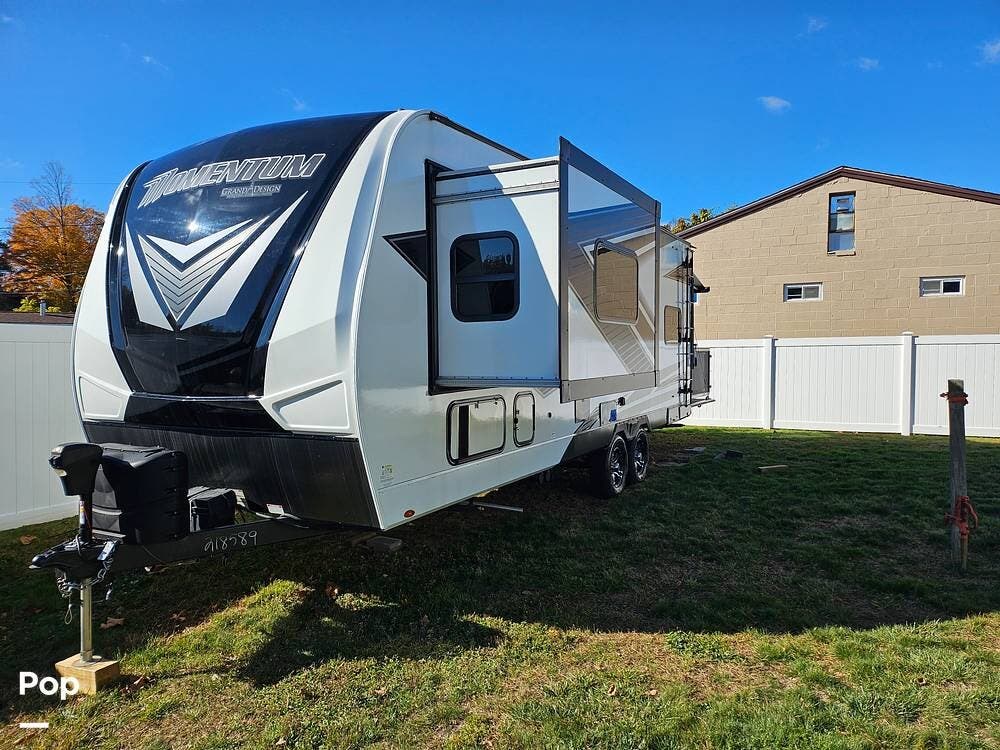 2023 Grand Design Momentum 23G - Used Toy Hauler For Sale by Pop RVs in Bristol, Connecticut features Slideout, Leveling Jacks, Awning, Air Conditioning, Generator