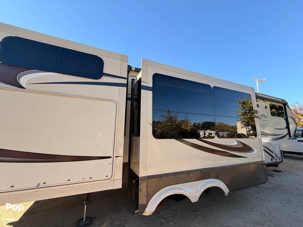 2015 Grand Design Solitude 366DEN - Used Fifth Wheel For Sale by Pop RVs in San Diego, California features Leveling Jacks, Air Conditioning, Awning, Slideout