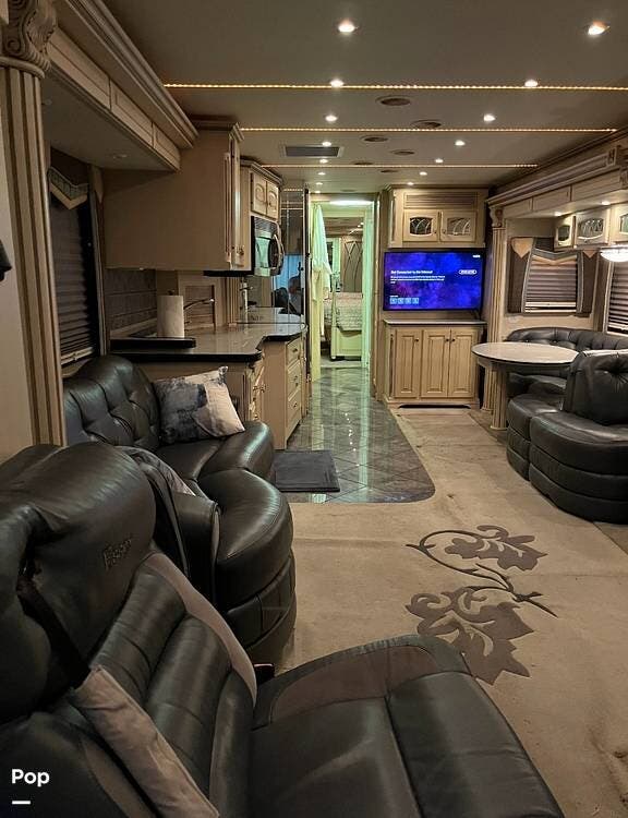 2005 Newmar Essex 4503 Westminster - Used Diesel Pusher For Sale by Pop RVs in Tyler, Texas features Awning, Leveling Jacks, Generator, Slideout, Air Conditioning