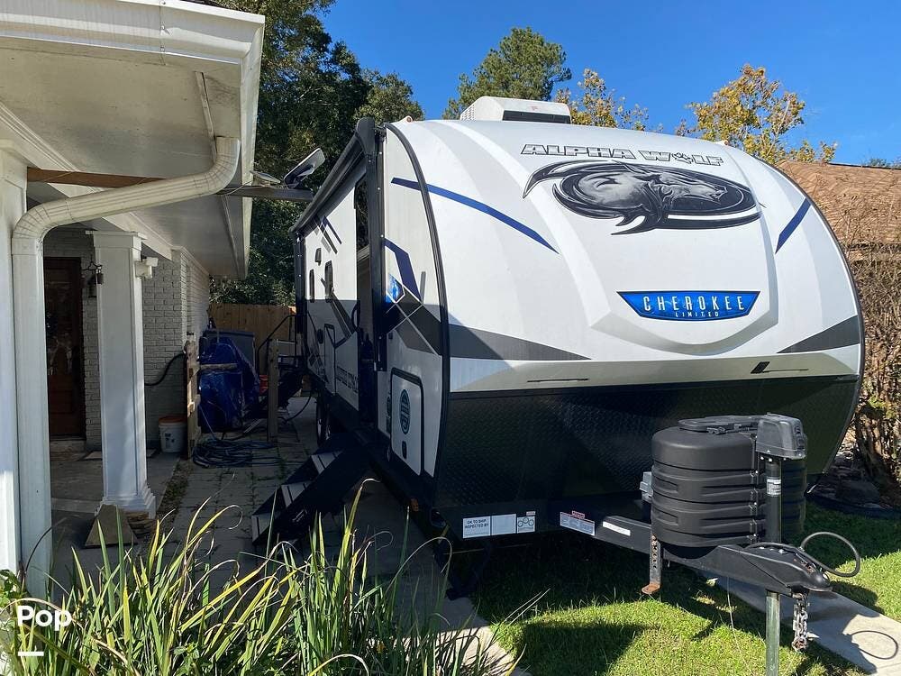 2024 Cherokee Alpha Wolf 2500RL-L - Used Travel Trailer For Sale by Pop RVs in Denham Springs, Louisiana features Air Conditioning, Slideout, Awning, Leveling Jacks