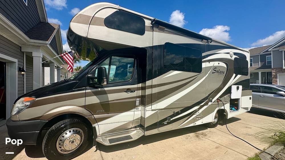 2014 Forest River Solera 24R - Used Class C For Sale by Pop RVs in Longs, South Carolina features Awning, Leveling Jacks, Slideout, Generator, Air Conditioning
