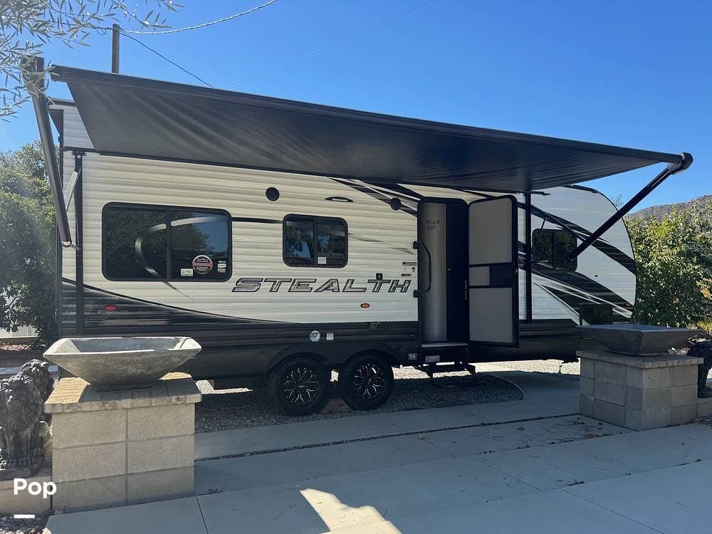 2023 Forest River Stealth 2113 - Used Toy Hauler For Sale by Pop RVs in Cherry Valley, California features Awning, Air Conditioning, Generator