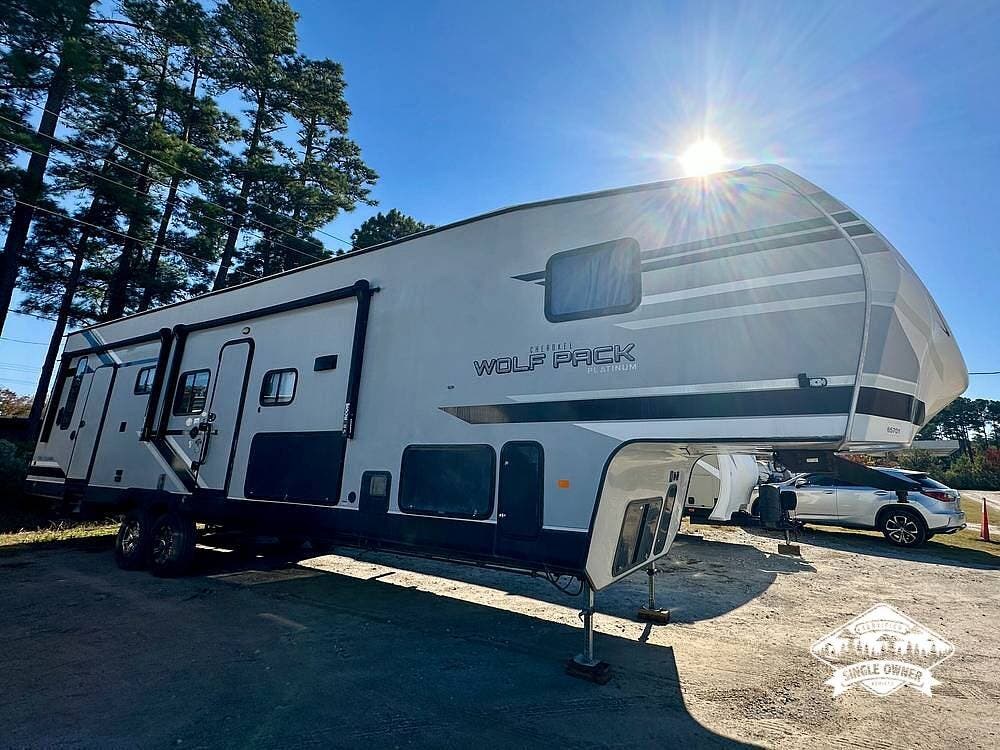 2021 Forest River Wolf Pack 335PACK13 - Used Toy Hauler For Sale by Pop RVs in Myrtle Beach, South Carolina features Slideout, Air Conditioning, Awning