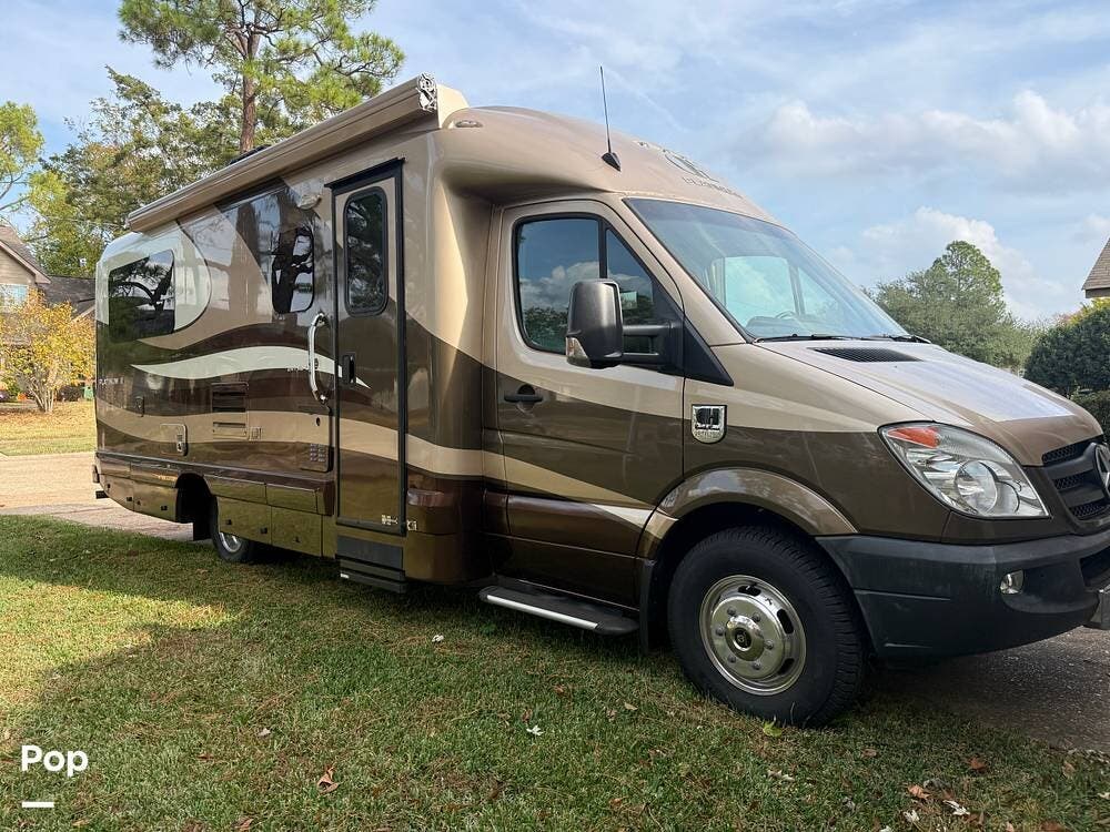 2013 Coach House Platinum 241XL DS - Used Class C For Sale by Pop RVs in Shreveport, Louisiana features Leveling Jacks, Generator, Slideout, Awning, Air Conditioning