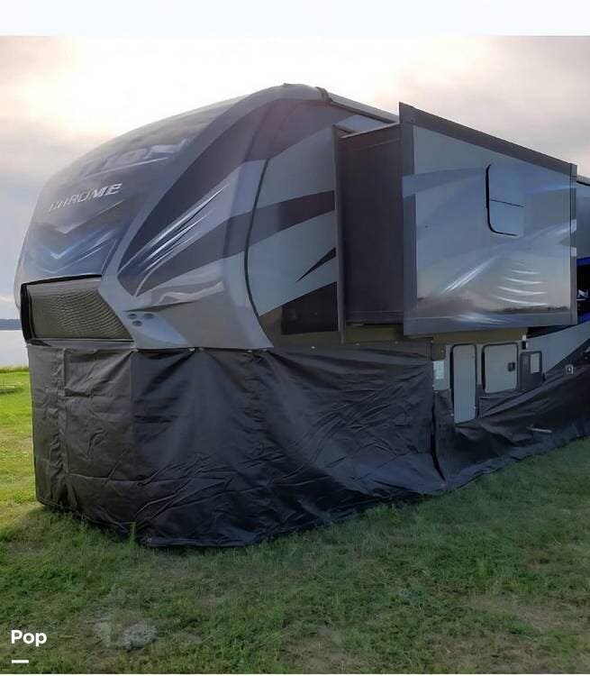 2016 Keystone Fuzion Chrome 420 - Used Toy Hauler For Sale by Pop RVs in Gillette, Wyoming features Leveling Jacks, Awning, Slideout, Air Conditioning, Generator