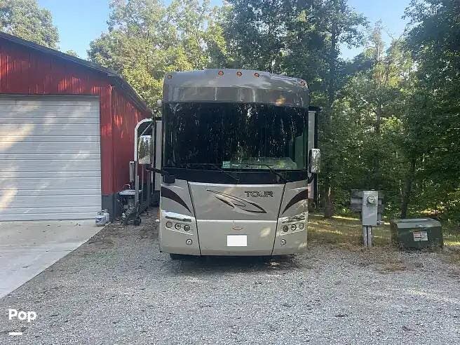 2008 Winnebago Tour 40TD - Used Diesel Pusher For Sale by Pop RVs in Monroe City, Missouri features Generator, Air Conditioning, Awning, Slideout