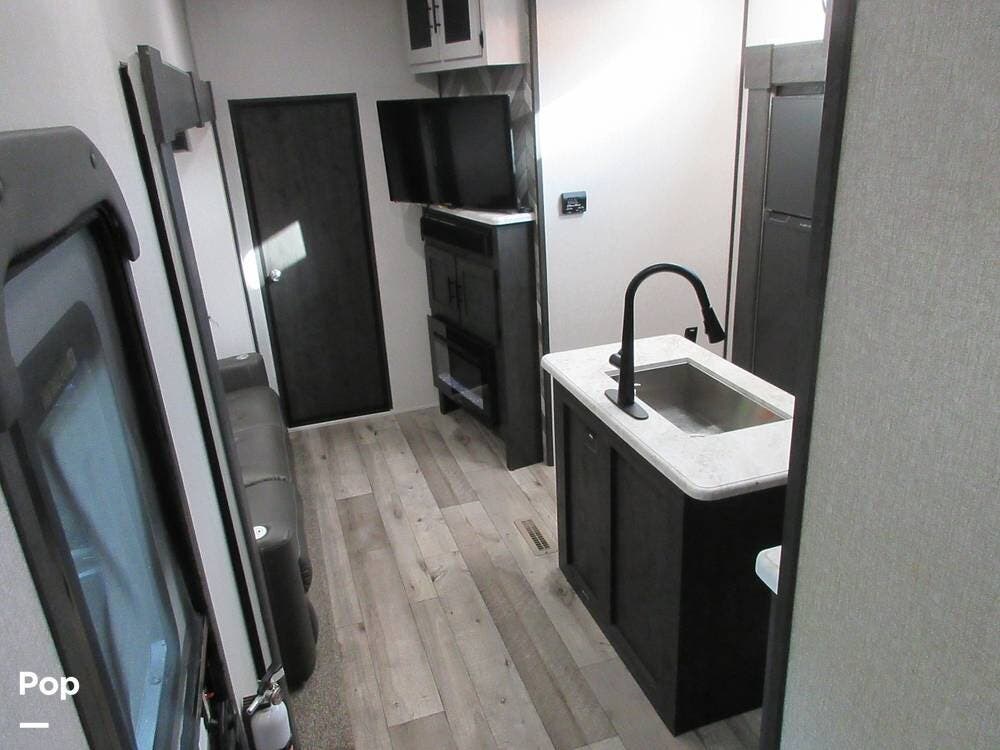 2022 K-Z Sportster 353TH13 - Used Toy Hauler For Sale by Pop RVs in Spicewood, Texas features Air Conditioning, Leveling Jacks, Awning, Slideout