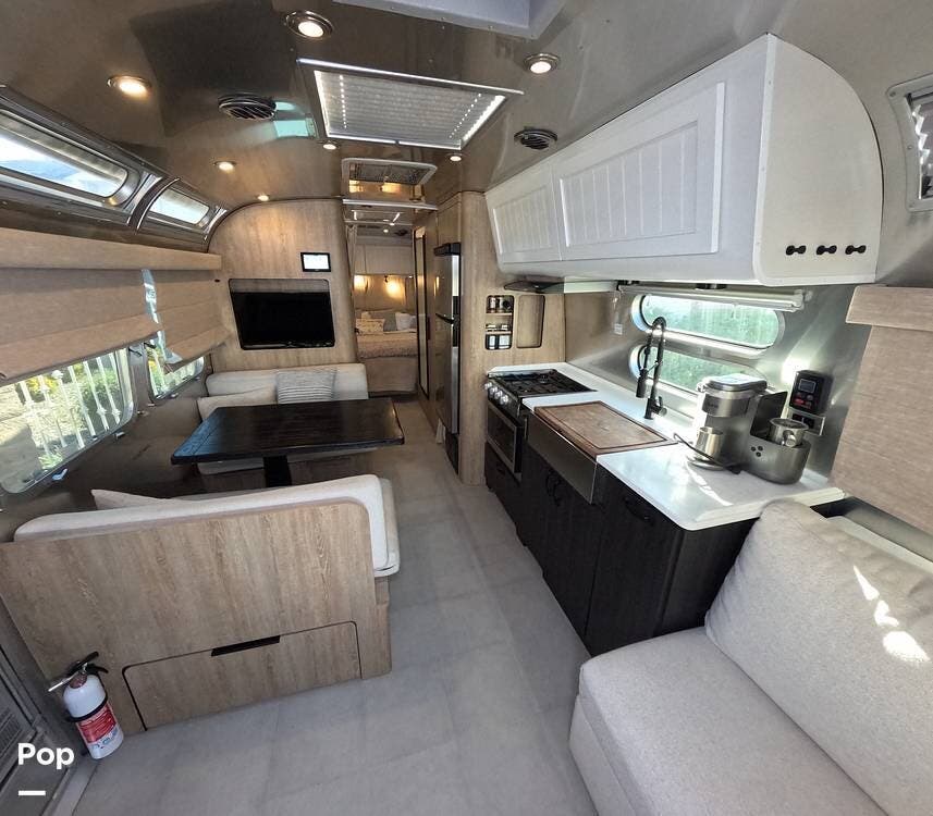 2022 Airstream Pottery Barn 28RBQ - Used Travel Trailer For Sale by Pop RVs in Encino, California features Air Conditioning, Leveling Jacks, Awning