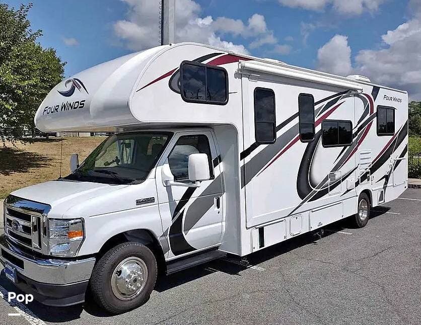 2021 Thor Motor Coach Four Winds 28Z - Used Class C For Sale by Pop RVs in Westfield, Massachusetts features Generator, Slideout, Air Conditioning, Awning