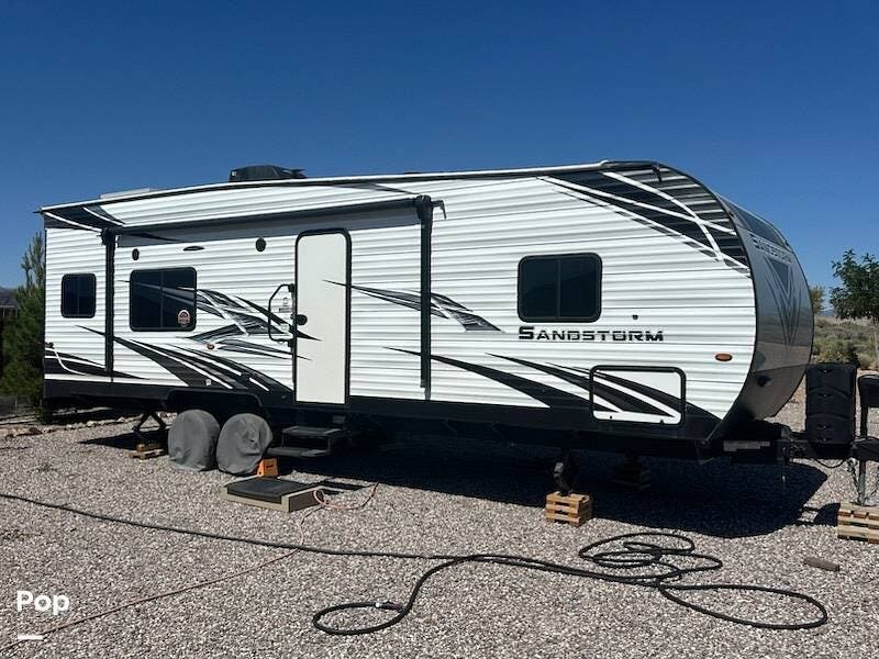 2021 Forest River Sandstorm 272SLC - Used Toy Hauler For Sale by Pop RVs in Caliente, Nevada features Awning, Air Conditioning, Generator, Slideout, Leveling Jacks