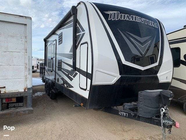 2021 Grand Design Momentum 29GO - Used Toy Hauler For Sale by Pop RVs in Ft Lupton, Colorado features Air Conditioning, Generator, Slideout, Awning