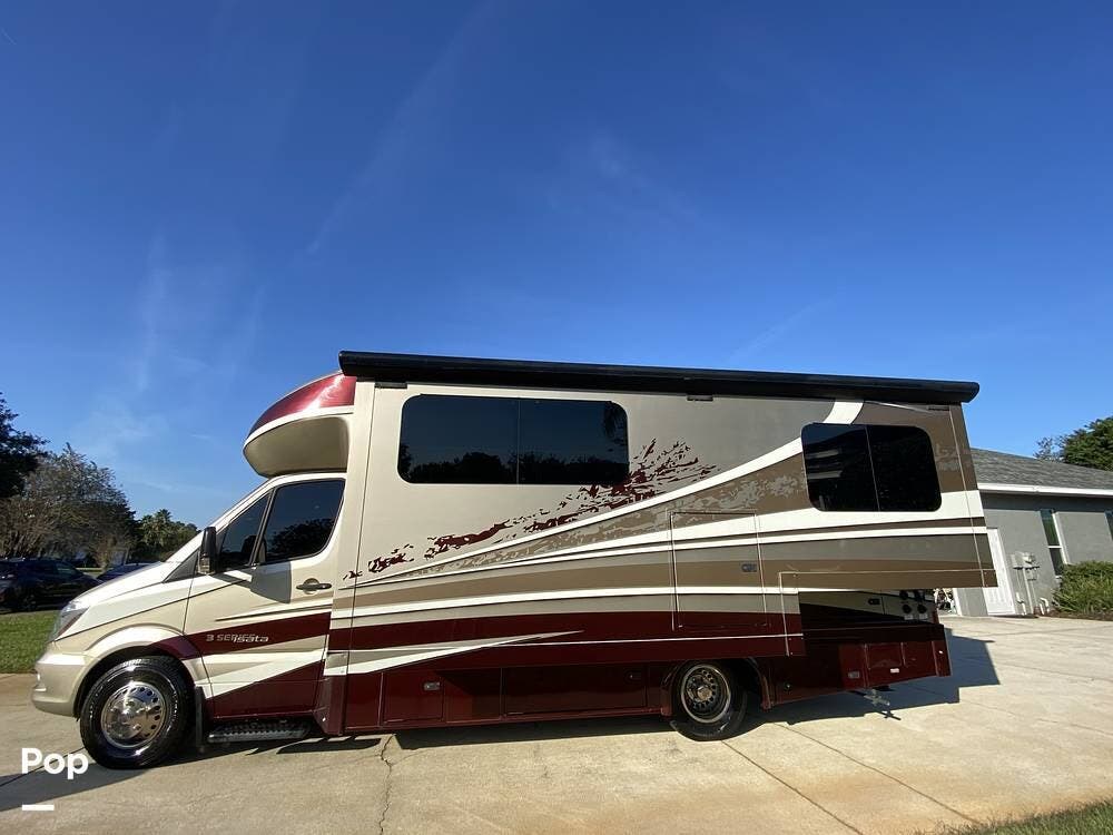 2018 Dynamax Corp Isata 3 24FWM - Used Class C For Sale by Pop RVs in Winter Haven, Florida features Generator, Slideout, Awning, Air Conditioning, Leveling Jacks