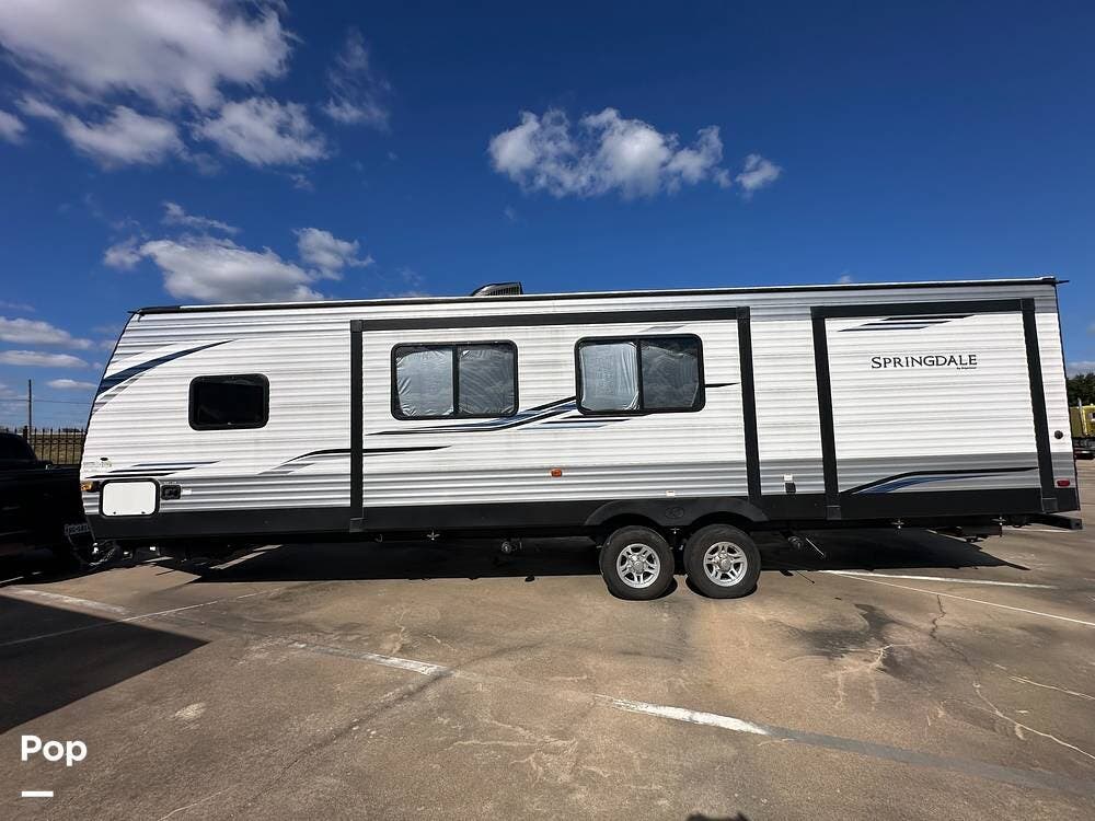 2021 Keystone Springdale 301TR - Used Travel Trailer For Sale by Pop RVs in Houston, Texas features Awning, Air Conditioning, Slideout, Leveling Jacks
