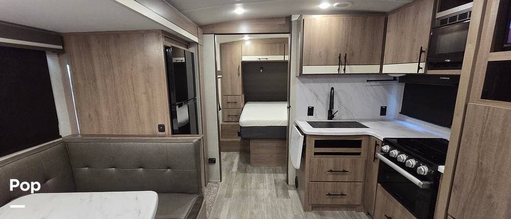 2023 Grand Design Imagine 2400BH - Used Travel Trailer For Sale by Pop RVs in Lewisville, Texas features Awning, Slideout, Air Conditioning, Leveling Jacks