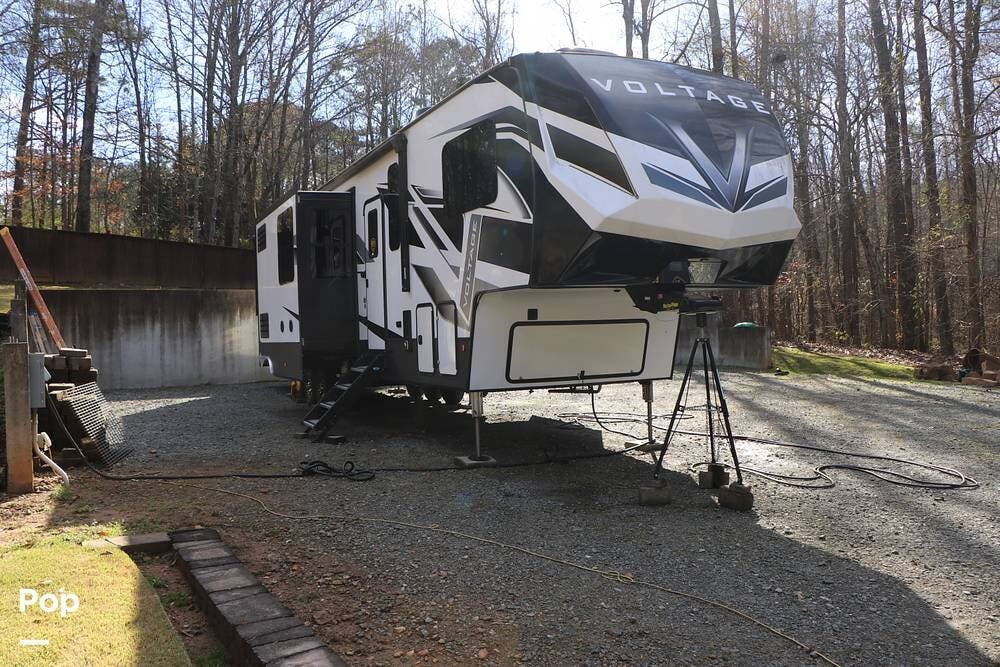 2021 Dutchmen Voltage 4195 - Used Toy Hauler For Sale by Pop RVs in Canton, Georgia features Air Conditioning, Leveling Jacks, Awning, Generator, Slideout