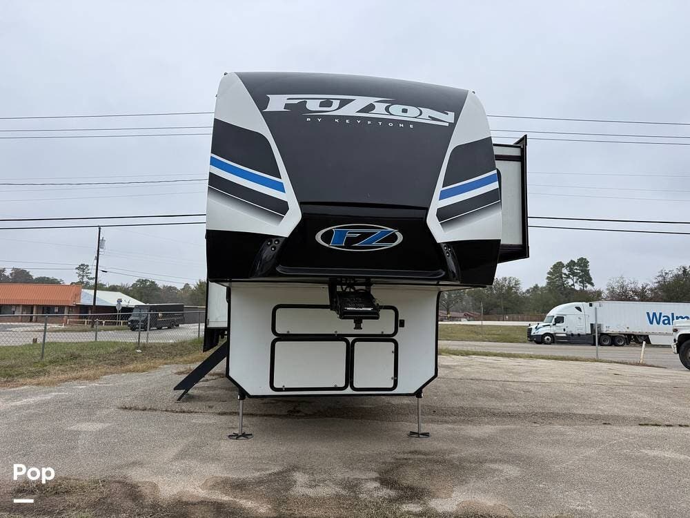 2022 Keystone Fuzion 379 - Used Toy Hauler For Sale by Pop RVs in Tyler, Texas features Awning, Air Conditioning, Generator, Slideout