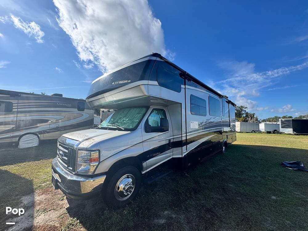 2018 Dynamax Corp Isata 31DS - Used Class C For Sale by Pop RVs in Wildwood, Florida features Air Conditioning, Awning, Generator, Slideout