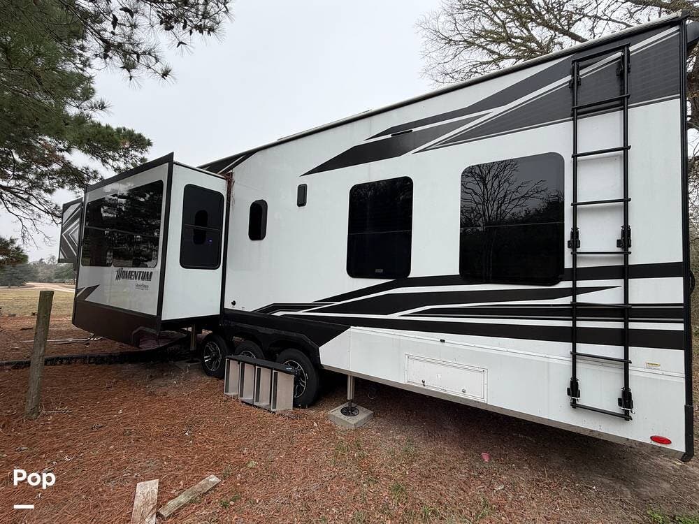 2024 Grand Design Momentum 399TH - Used Toy Hauler For Sale by Pop RVs in La Grange, Texas features Awning, Generator, Air Conditioning, Slideout