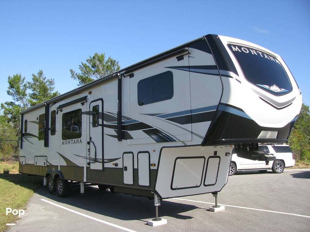 2021 Keystone Montana 3761FL - Used Fifth Wheel For Sale by Pop RVs in Daytona Beach, Florida features Air Conditioning, Leveling Jacks, Slideout, Awning