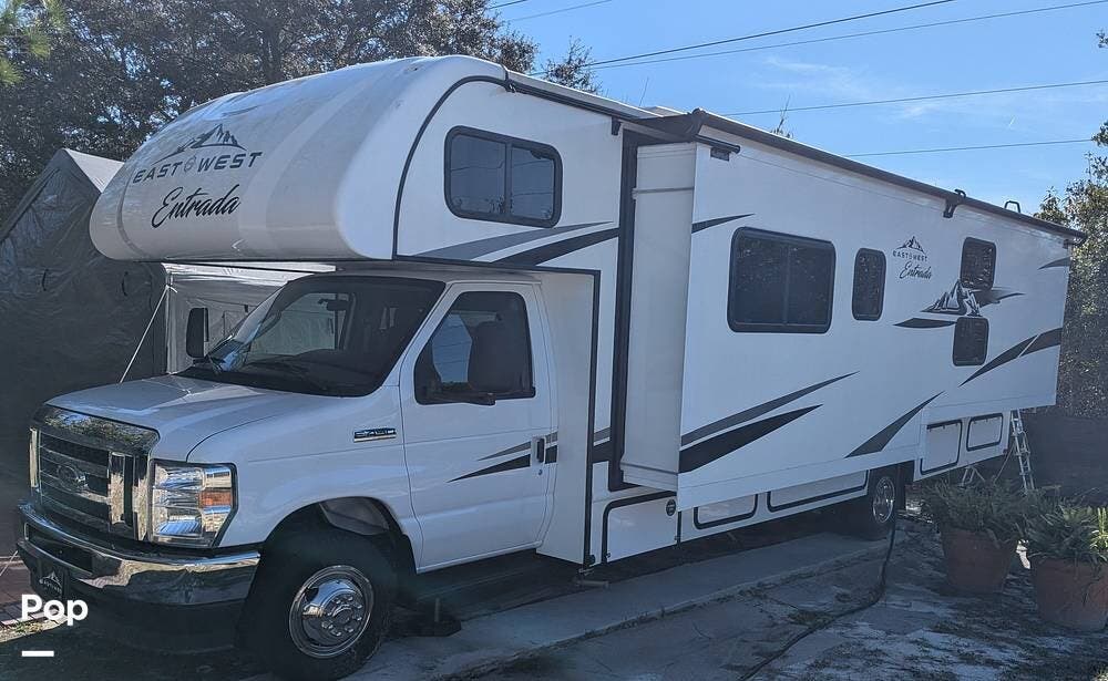 2024 East to West Entrada 3100FB - Used Class C For Sale by Pop RVs in Deltona, Florida features Awning, Generator, Slideout, Air Conditioning