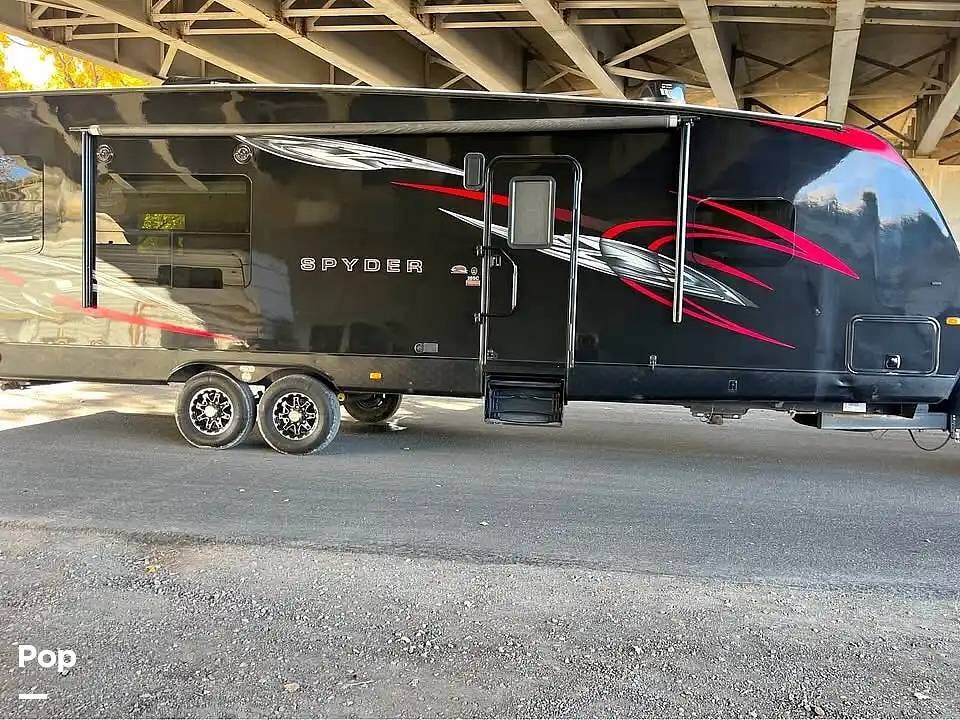 2017 Winnebago Spyder 28SC - Used Toy Hauler For Sale by Pop RVs in Ogden, Utah features Slideout, Air Conditioning, Awning, Leveling Jacks