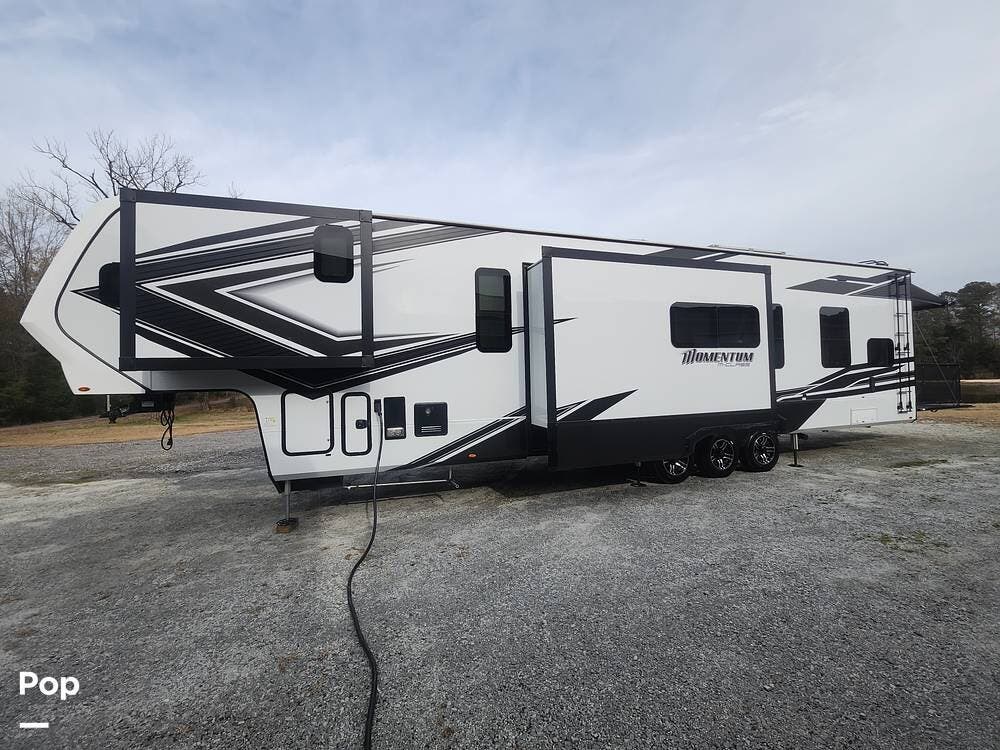 2024 Grand Design Momentum 395MS - Used Toy Hauler For Sale by Pop RVs in Prosperity, South Carolina features Slideout, Awning, Air Conditioning, Leveling Jacks, Generator
