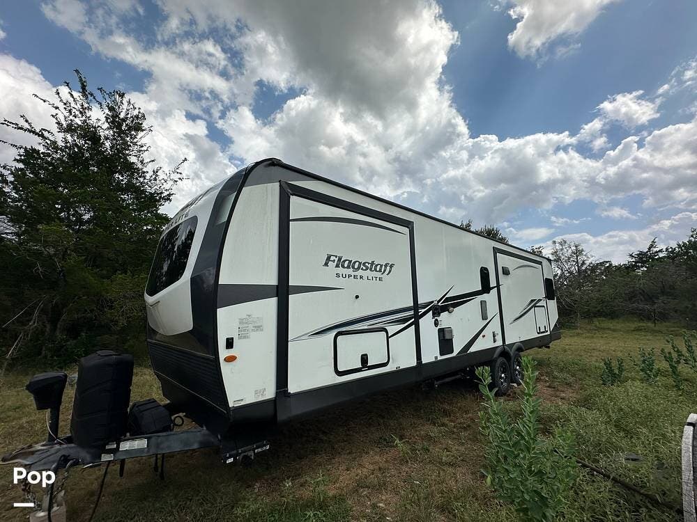 2022 Forest River Flagstaff 29RLBS - Used Travel Trailer For Sale by Pop RVs in Red Rock, Texas features Leveling Jacks, Air Conditioning, Slideout, Awning