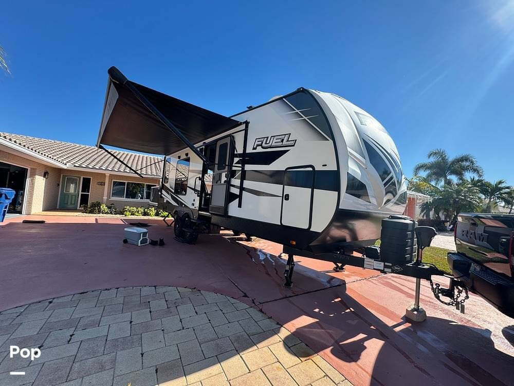 2024 Heartland Fuel F255 - Used Toy Hauler For Sale by Pop RVs in New Port Richey, Florida features Air Conditioning, Awning, Slideout, Generator