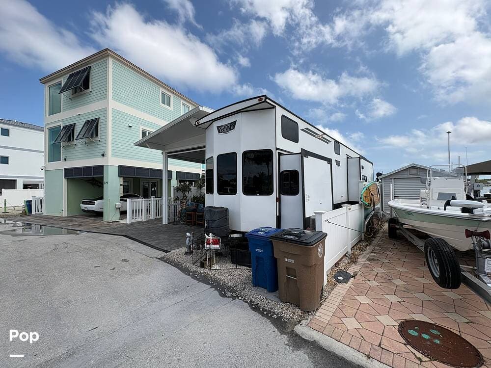 2022 Forest River Wildwood 42DL - Used Travel Trailer For Sale by Pop RVs in Key Largo, Florida features Air Conditioning, Awning, Slideout