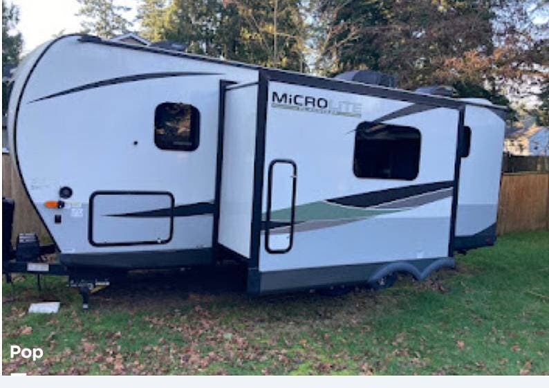 2023 Forest River Micro Lite 25BRDS - Used Travel Trailer For Sale by Pop RVs in Lakewood, Washington features Awning, Leveling Jacks, Air Conditioning, Slideout