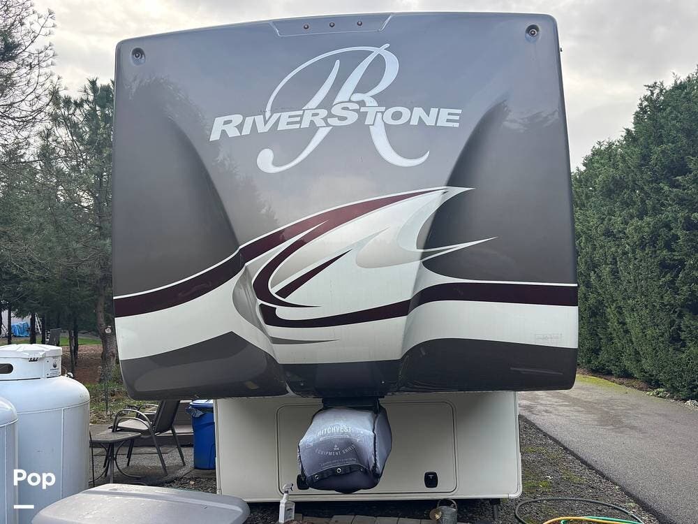 2016 Forest River RiverStone Legacy 38FB - Used Fifth Wheel For Sale by Pop RVs in West Linn, Oregon features Leveling Jacks, Air Conditioning, Awning, Generator, Slideout