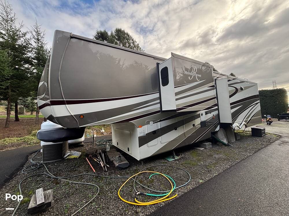 2016 Forest River RiverStone Legacy 38FB - Used Fifth Wheel For Sale by Pop RVs in West Linn, Oregon features Leveling Jacks, Awning, Slideout, Air Conditioning