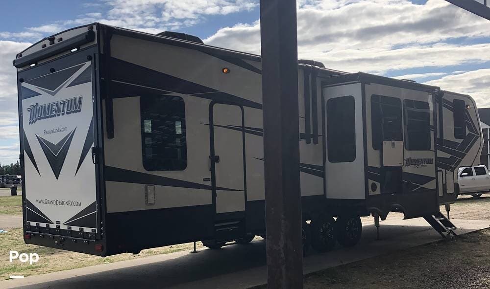 2019 Grand Design Momentum 381M - Used Toy Hauler For Sale by Pop RVs in Brainerd, Minnesota features Leveling Jacks, Slideout, Generator, Air Conditioning, Awning