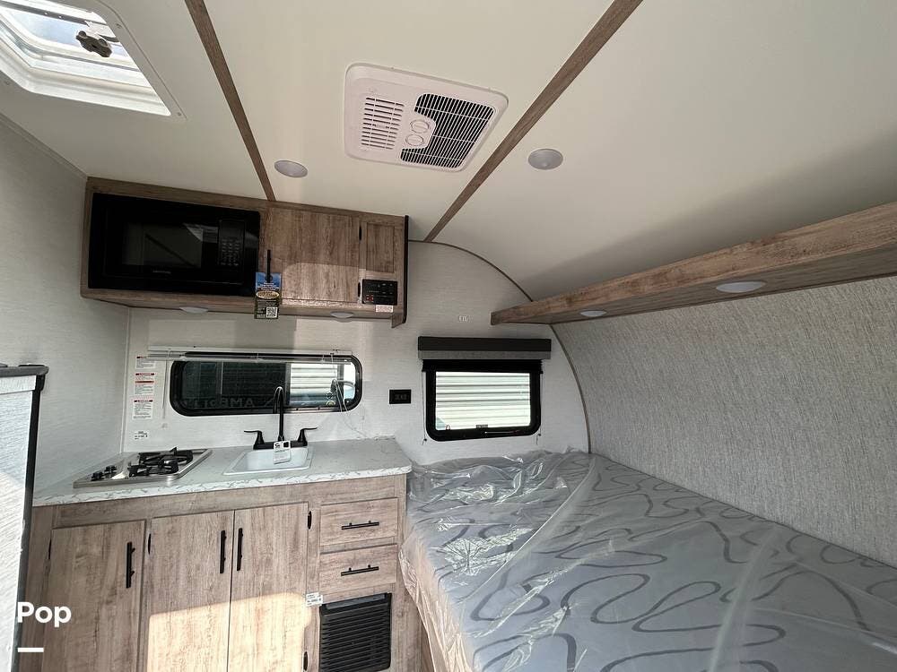 2025 Gulf Stream Ameri-Lite 134BH - Used Travel Trailer For Sale by Pop RVs in Ocala, Florida features Awning, Air Conditioning, Leveling Jacks