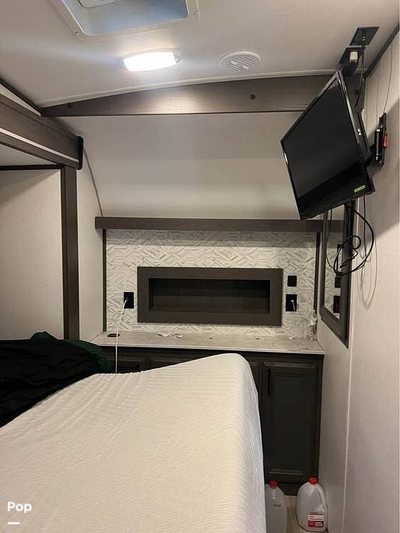 2022 Cruiser RV Stryker STG 3313 - Used Toy Hauler For Sale by Pop RVs in Michigan Center, Michigan features Generator, Leveling Jacks, Slideout, Air Conditioning, Awning