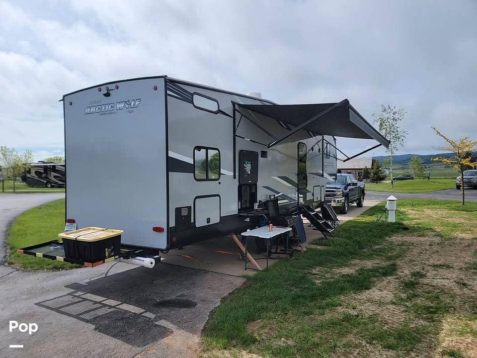 2022 Cherokee Arctic Wolf 287BH - Used Travel Trailer For Sale by Pop RVs in Box Elder, South Dakota features Slideout, Air Conditioning, Awning, Leveling Jacks