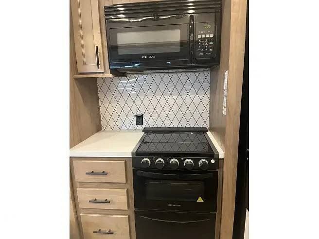 2023 Forest River Sabre 38DBQ - Used Fifth Wheel For Sale by Pop RVs in Eugene, Oregon features Awning, Air Conditioning, Leveling Jacks, Slideout