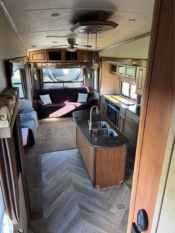 2017 Forest River Cedar Creek 36CKTS - Used Travel Trailer For Sale by Pop RVs in Curtice, Ohio features Air Conditioning, Awning, Leveling Jacks, Slideout