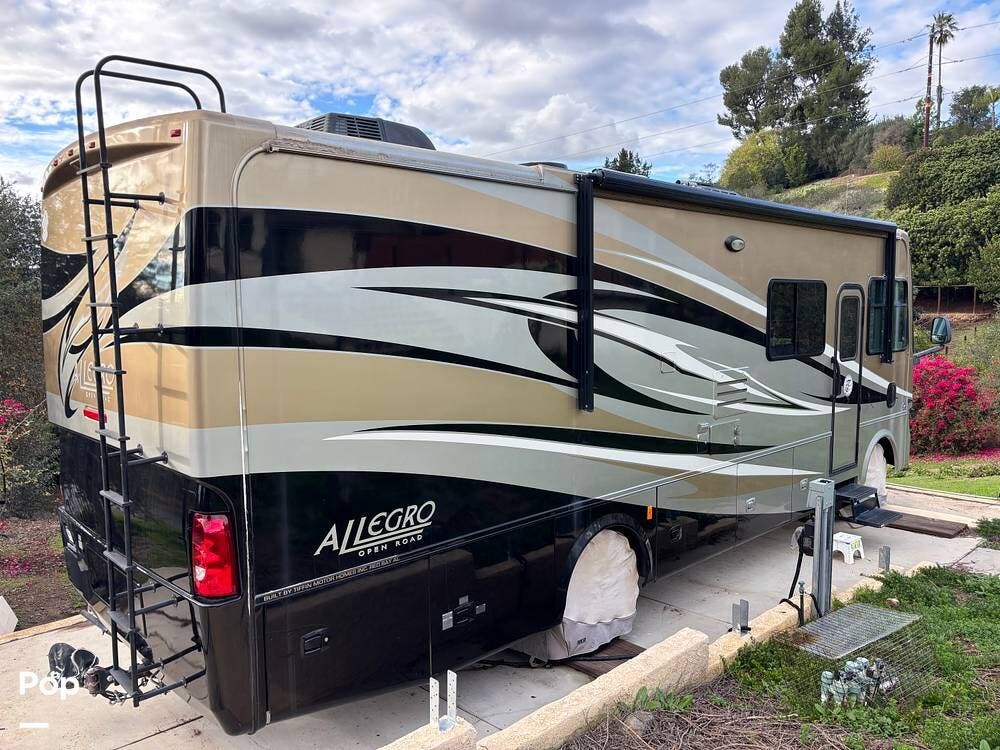 2011 Tiffin Allegro Open Road 30GA - Used Class A For Sale by Pop RVs in Escondido, California features Leveling Jacks, Generator, Slideout, Awning, Air Conditioning