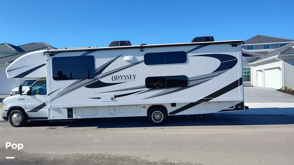 2023 Entegra Coach Odyssey 31F - Used Class C For Sale by Pop RVs in N Fort Myers, Florida features Slideout, Awning, Generator, Leveling Jacks, Air Conditioning